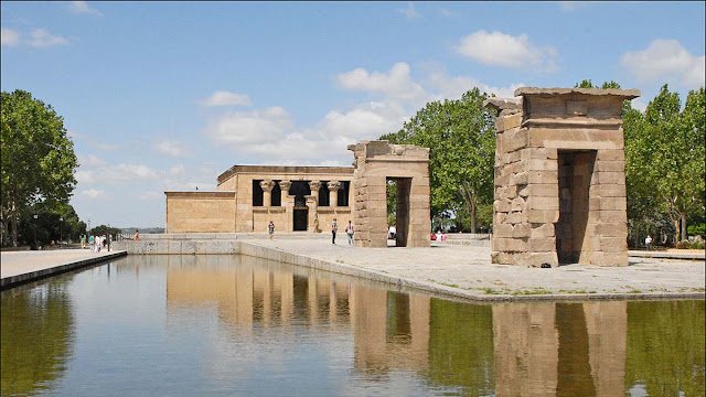 Temple of Debod at sunset with reflections in the pond