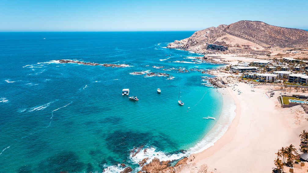 https://ik.imgkit.net/3vlqs5axxjf/TAW/ik-seo/uploadedImages/All_Gateways/Mexico/Features/LosCabosBeaches_NewHero/5-of-the-Best-Swimmable-Los-Cabos-Beaches.jpg?tr=w-1008%2Ch-567%2Cfo-auto